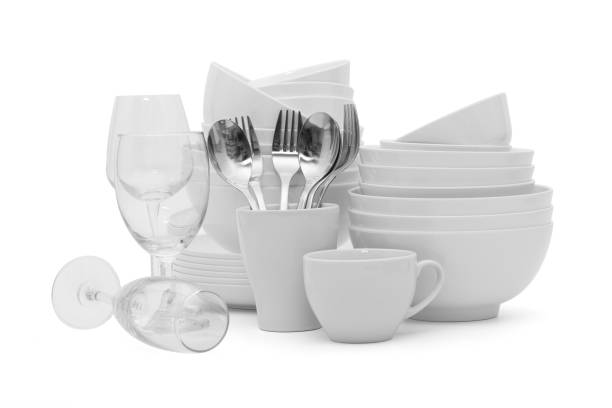 istock set clean dishes glasses on white background 1255538877