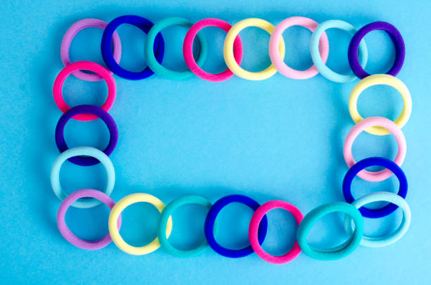 istock Colored hair ties on bright background. Photo 1255540406