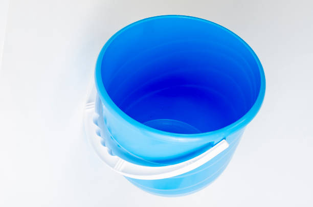 istock Bucket new blue empty isolated on white background. 1255542345