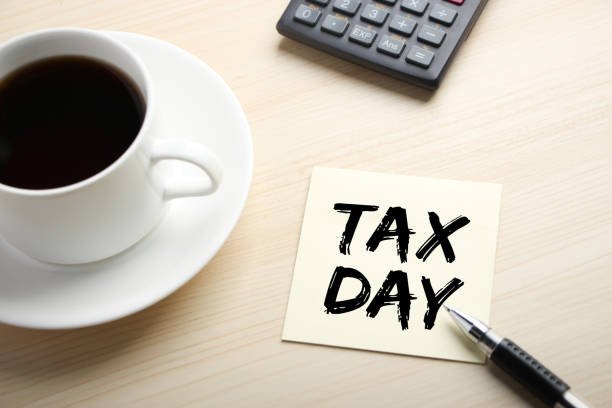 istock Tax Day Concept On Sticky Note 1255543947