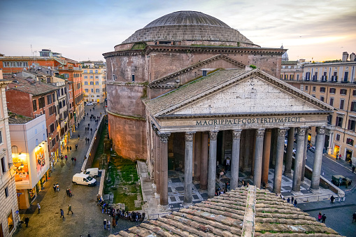 Rome, Italy, January 07 -- A view of the iconic Roman Pantheon dome, one of the best preserved Roman structures in the eternal city. Built in 27 BC by the consul Marco Vispanio Agrippa for the emperor Augustus, it was dedicated to all Roman divinities. In the picture we can appreciate the mighty columns and the magnificent dome, still today one of the largest in the world, characterized by an opening called 'oculus' placed at its top. Currently in the Pantheon it is home to a Catholic church and inside there are the tombs of some Italian kings and the remains of the great Renaissance artist Raffaello Sanzio (Raphael). Image un High Definition Format.