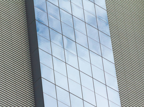 istock modern architecture building facade in glass and concrete 1255548885