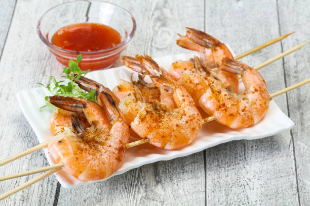 istock Grilled prawn skewer with sauce 1255550207