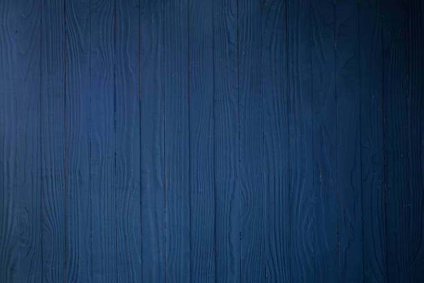 istock blue dark painted wooden background 1255551009