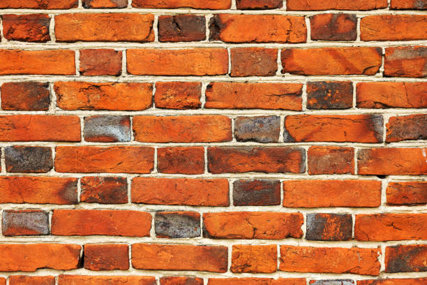 istock Abstract background old white brick wall with cracks and scratches. Landscape style. Great background or texture. 1255555600