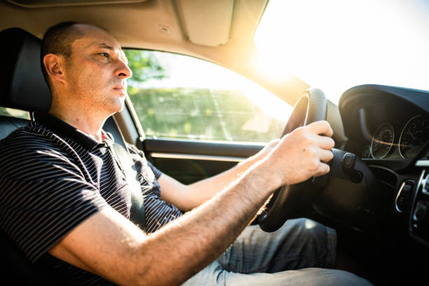 istock Mature man driving his car 1255559305