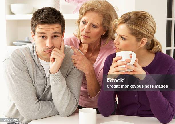 Older Woman In Between Young Woman And Young Man Stock Photo - Download Image Now - Mother-In-Law, Nosy, In-Law Relations