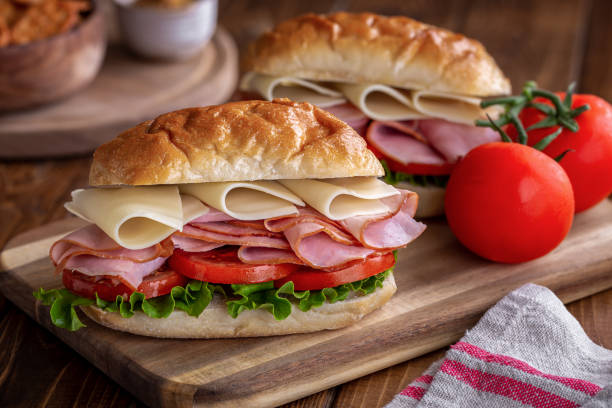 panino al prosciutto e formaggio - cheese sandwich foto e immagini stock