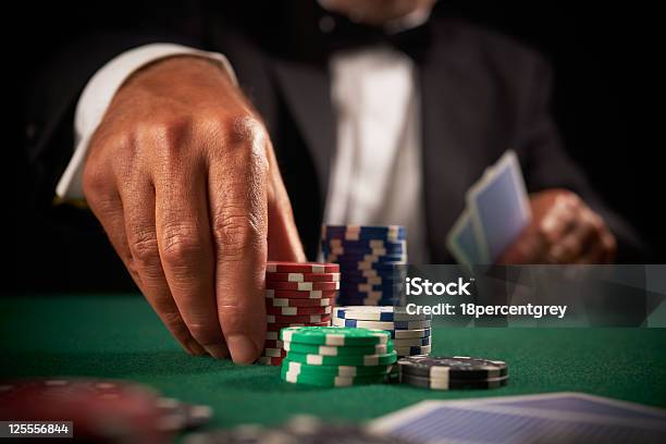 Card Player Gambling In Casino Stock Photo - Download Image Now - Poker - Card Game, Blackjack, Gambling