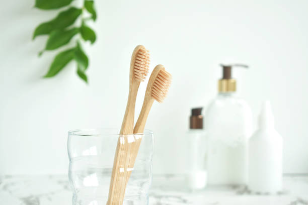 istock Bamboo toothbrush, soap and green leafs Biodegradable personal care products. No plastic 1255569098