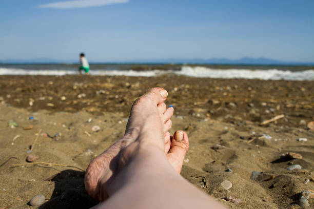 istock Relaxing At The Beach With A Child 1255571221