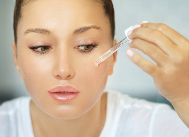 istock Magic anti-aging cream.Applying the cream 1255572330