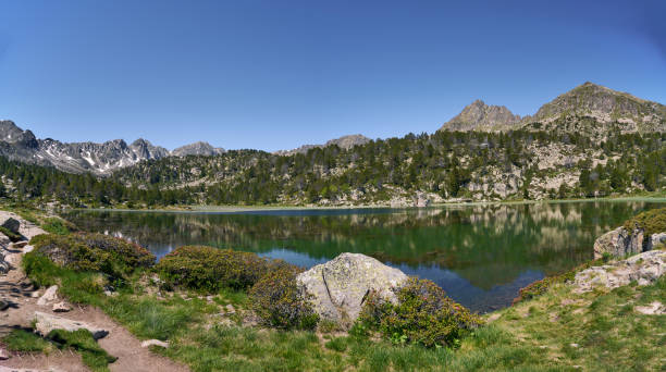 istock panoramic lake and mountains in the andorran pyrenees 1255574794