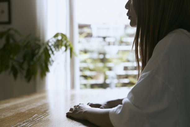 istock woman enjoying a home cafe 1255574907