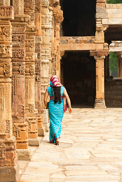 istock Woman walking in Indian Temple 125557623