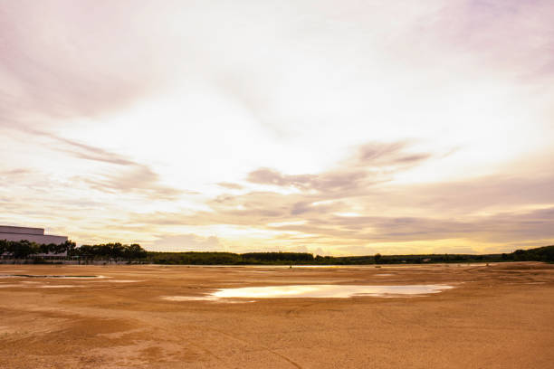 istock Landscape view of sand terrace with orange sunset sky 1255576714