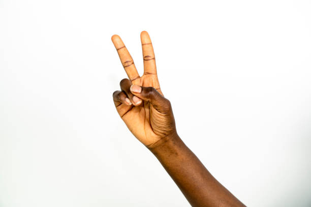 istock African american hand making peace gesture - Black people 1255576883