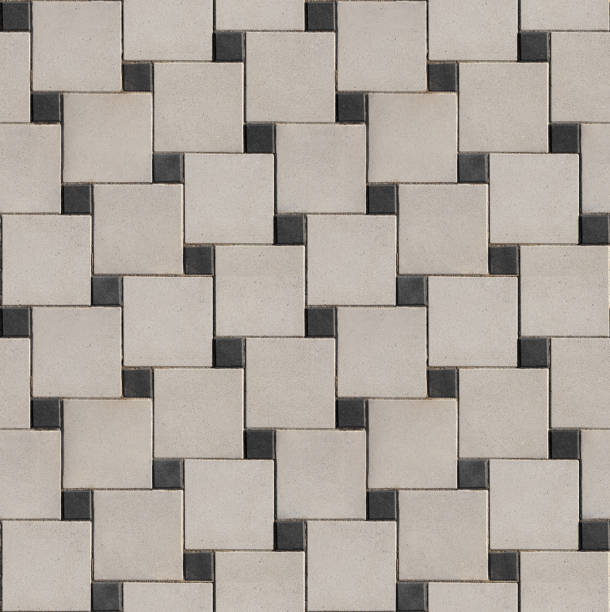 istock Combination of square paving tiles of different sizes. 1255580375