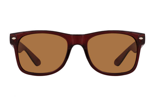 istock Sunglasses with a brown plastic frame and brown lenses isolated on white background. 1255581508