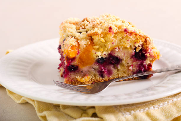 istock Fruit and berry cake with crumble topping 1255584205