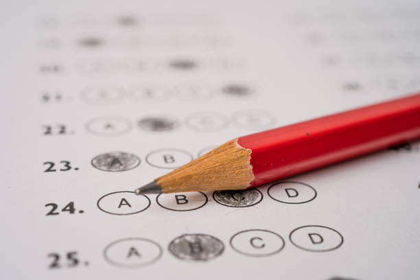 istock Answer sheets with Pencil drawing fill to select choice, education concept 1255584782