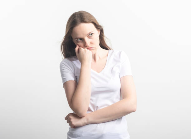 istock Woman bored, tired or fed up with conversation On a white background. 1255585642