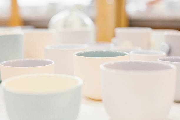 istock Set of multicoloured ceramic minimalistic vase and cups. 1255589344