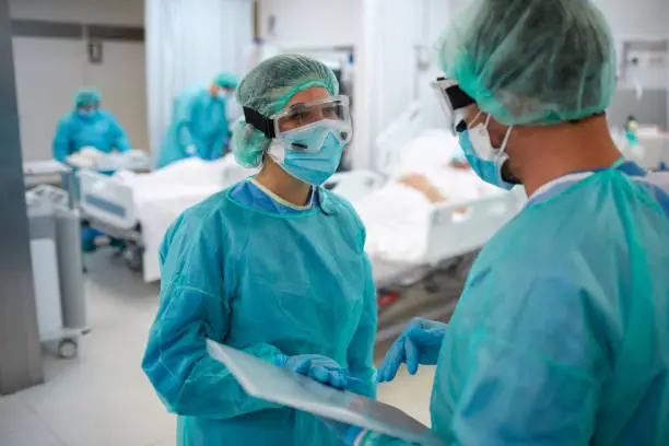 Two healthcare workers talking at the UCI