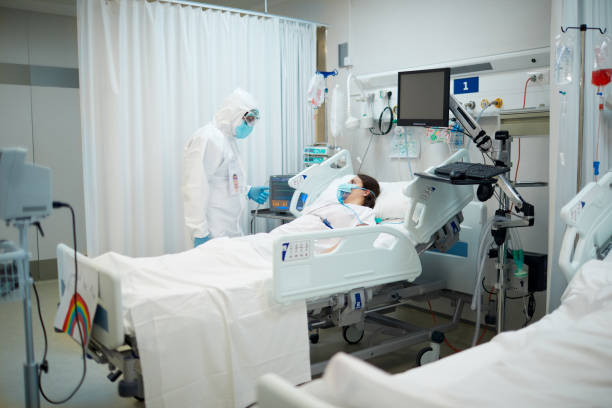 istock A doctor visiting a COVID patient at the ICU. 1255590918