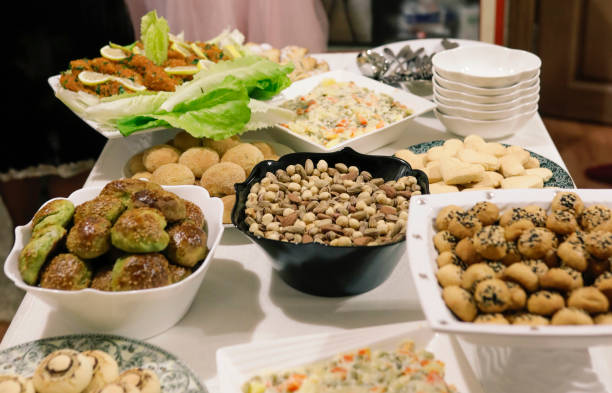 istock Dining table filled with food and snacks. 1255591915