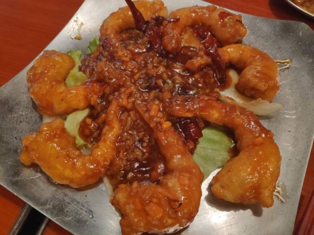 istock Chinese-style chili shrimp dish 1255595246