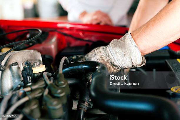 Car Mechanic In Repair Shop Stock Photo - Download Image Now - Auto Mechanic, Auto Repair Shop, Adult