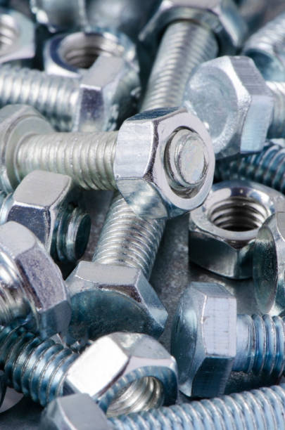 istock Metal bolts and nuts. Tools for working and fixing. Macrophotography. 1255597448
