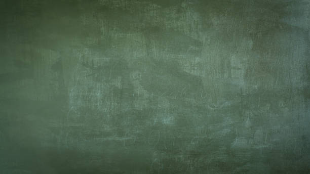 istock Blank front Real green chalkboard background texture in college concept for back to school kid wallpaper for create white chalk text draw graphic. Empty old back wall education 1255597473