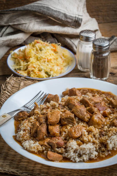 istock Barley groats with stewed meat. 1255597652