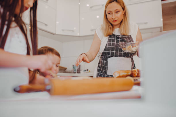 istock A pregnant woman prepares dough 1255601420