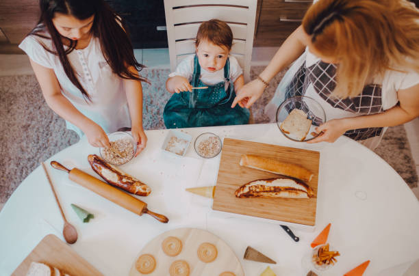 istock Baking cookies with my Girls 1255601436