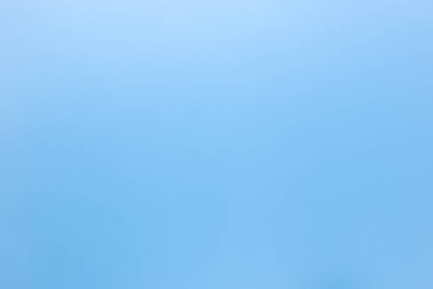 istock Smooth sky blue color paper for background 1255604806