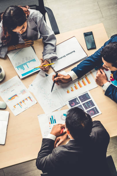 istock Business people group meeting shot from top view 1255609374