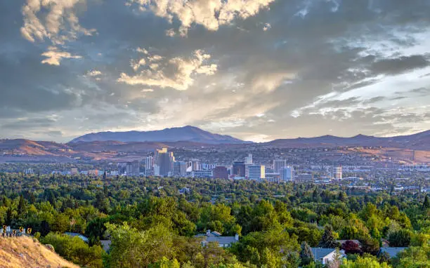 Cityscape of the downtown Reno Nevada skyline with hotels and casinos.