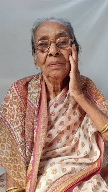 istock village woman, 1255615251