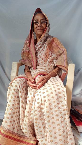 istock village woman, 1255615289