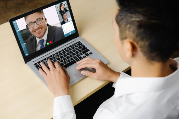 istock Video call business people meeting on virtual workplace or remote office 1255617175