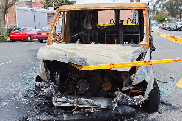 Front view of burnt down van with trespassing cordon tape on the street, full frame horizontal composition\n\n[url=file_closeup?id=17642996][img]/file_thumbview/17642996/1[/img][/url] [url=file_closeup?id=17643326][img]/file_thumbview/17643326/1[/img][/url] [url=file_closeup?id=17554211][img]/file_thumbview/17554211/1[/img][/url] [url=file_closeup?id=17623884][img]/file_thumbview/17623884/1[/img][/url] [url=file_closeup?id=17707658][img]/file_thumbview/17707658/1[/img][/url] [url=file_closeup?id=62918008][img]/file_thumbview/62918008/1[/img][/url] [url=file_closeup?id=17553982][img]/file_thumbview/17553982/1[/img][/url] [url=file_closeup?id=16150993][img]/file_thumbview/16150993/1[/img][/url] [url=file_closeup?id=16150772][img]/file_thumbview/16150772/1[/img][/url] [url=file_closeup?id=16150911][img]/file_thumbview/16150911/1[/img][/url] [url=file_closeup?id=17657386][img]/file_thumbview/17657386/1[/img][/url] [url=file_closeup?id=17669284][img]/file_thumbview/17669284/1[/img][/url] [url=file_closeup?id=17601633][img]/file_thumbview/17601633/1[/img][/url] [url=file_closeup?id=17561941][img]/file_thumbview/17561941/1[/img][/url] [url=file_closeup?id=17562111][img]/file_thumbview/17562111/1[/img][/url]