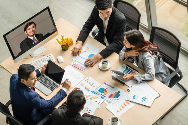 istock Video call group business people meeting on virtual workplace or remote office 1255619485