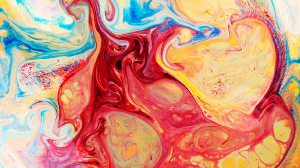 istock Fluid Art. Abstract blurred multi-colored background. Swirl liquid pattern. Trendy colorful backdrop. Mixing paints 1255623447