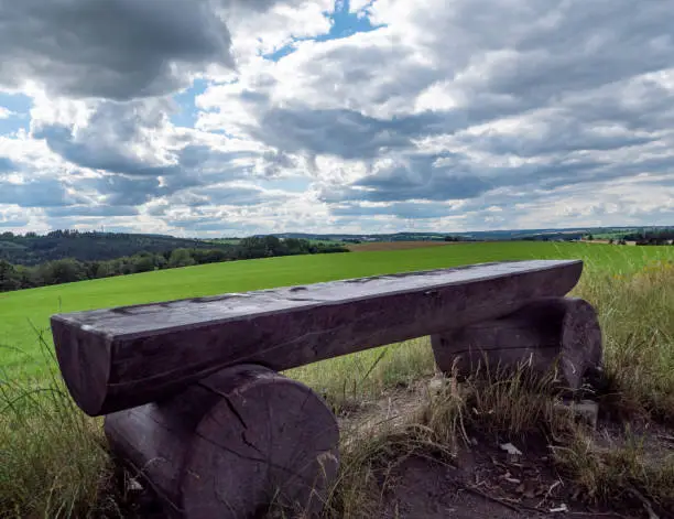 Wooden bench in the Vogtland in the low mountain range