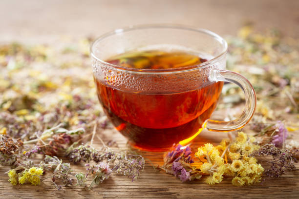 istock Cup of herbal tea with dried herbs 1255628153