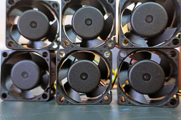istock six small cooling fans on the table 1255629323