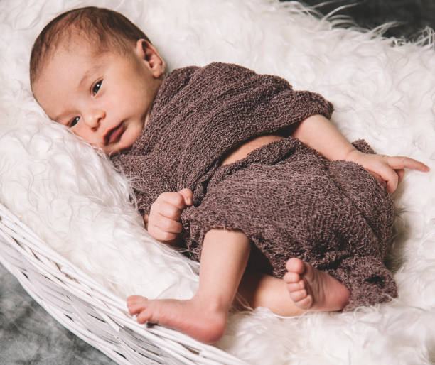 istock Newborn baby boy just awake 1255635967